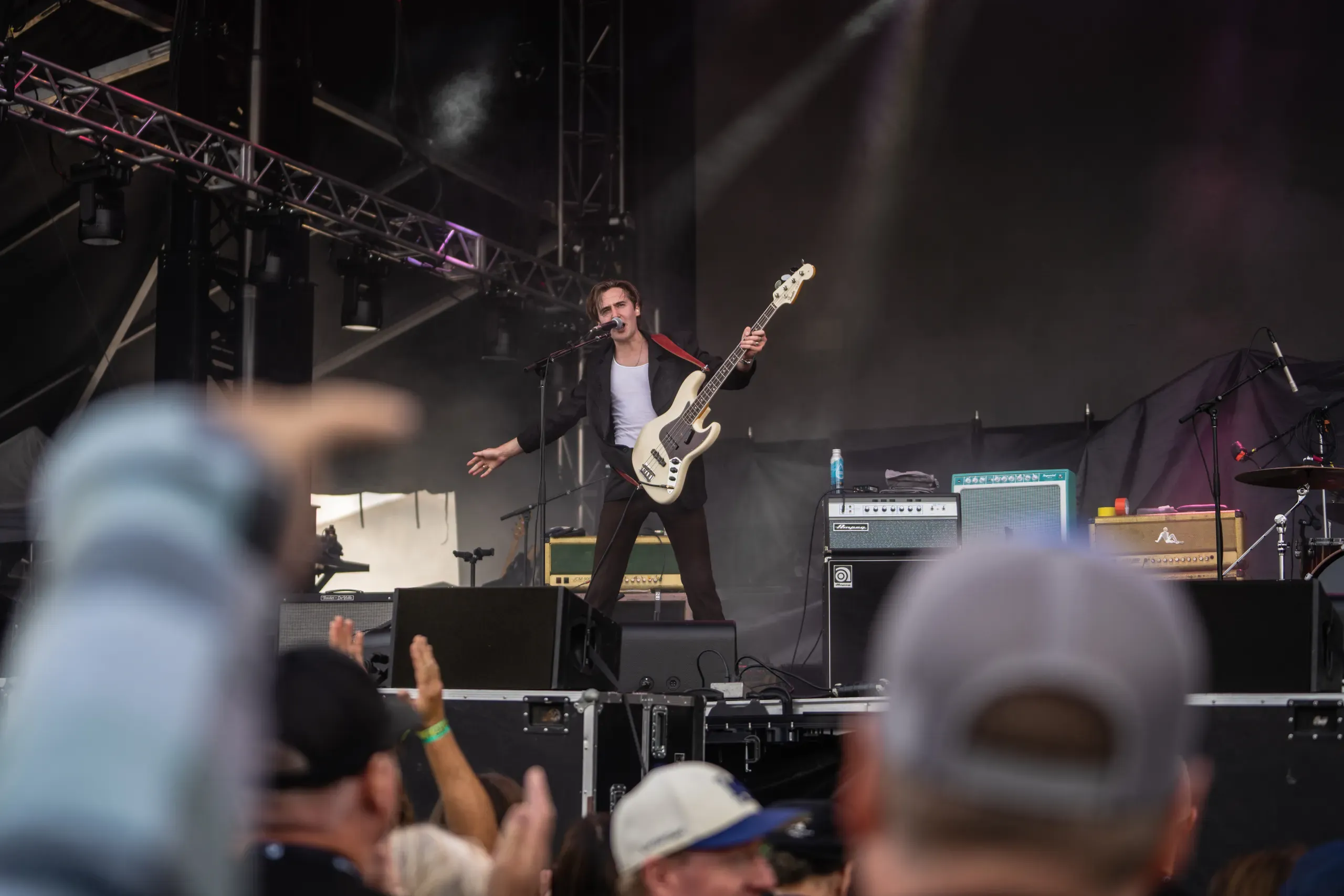 A bassist performing onstage at Wildlands in 2023.