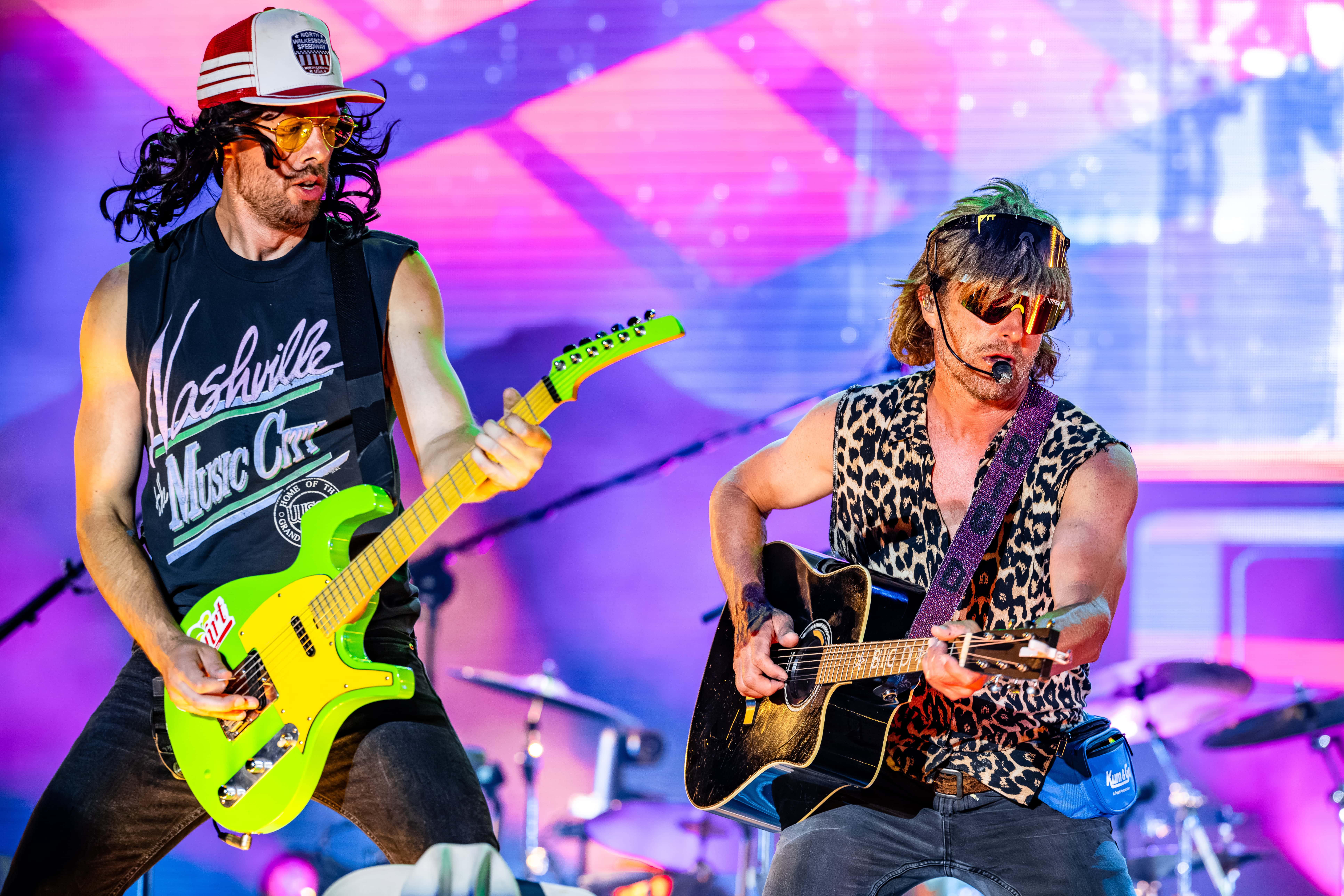 Lord Huron performing beneath orange stage lights at Wildlands in 2023.