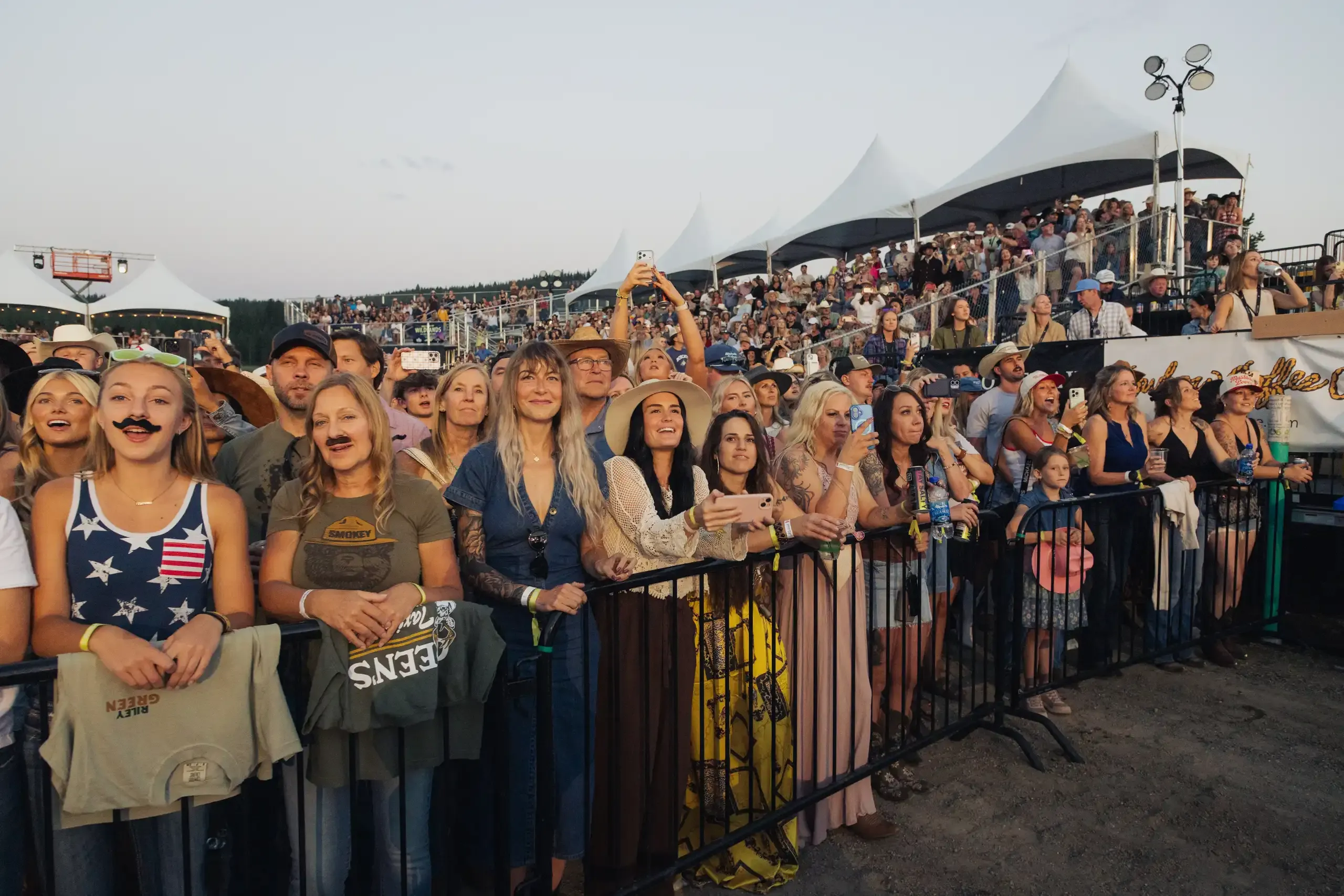 Guests gathered in front of the Wildlands stage.